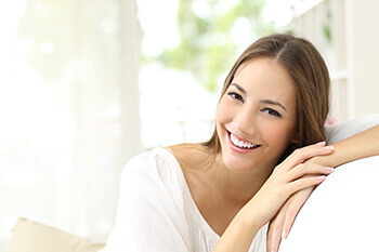 Young woman smiling after LASIK